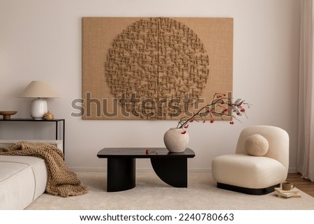 Aesthetic composition of living room interior with mock up poster frame, modular sofa, oval shapes armchair, stylish coffee table, vase with rowan and personal accessories. Home decor. Template. 