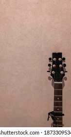 Aesthetic Guitar With Wall Backgroung