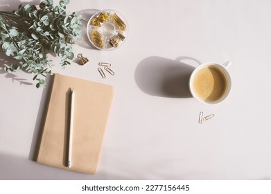 aesthetic minimalist workspace. Home office, blog, social media concept. Note book, coffee and pencil in soft pastele colors - Powered by Shutterstock