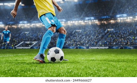 Aesthetic Shot Of Athletic Hispanic Footballer Shooting A Penalty Kick On Stadium With Crowd Cheering. Player Scoring a Goal At International Soccer Championship Final Match With Fans On Tribune