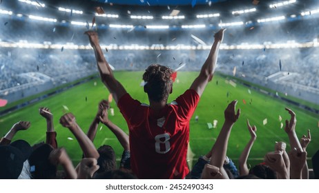 Aesthetic Shot of Fans Cheer for the Team on a Stadium During Soccer Championship Match. Team Scores Goal, Crowd of Fans Scream, Celebrate Victory with Confetti. Football Cup On National Arena Concept