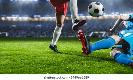 Aesthetic Shot of Red Team Soccer Football Player Successfully Avoiding Sliding Tackle From Opponent on Stadium With Fans Cheering. Dangerous Moment During Championship Final Match On National Arena - Powered by Shutterstock