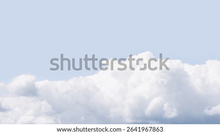 Aesthetic spring or summer sky clouds banner with space for text. Minimal blue sky background