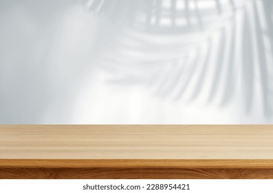 Aesthetic Wooden Table with realistic tropical leaves shadow overlay effect white wall