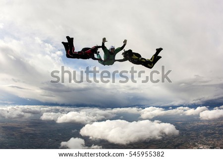 Aff course with Student and jump master with cloudy background
