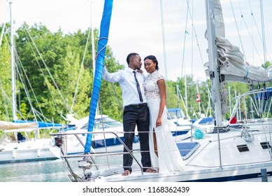 Affectionate Young African American Couple On A Sail Boat