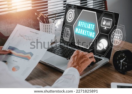 Affiliate marketing concept, Business person analyzing financial data on laptop computer with affiliate marketing icon on virtual screen, Digital Marketing content planning advertising strategy.

