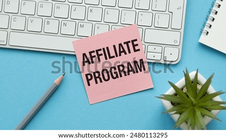 Affiliate Program text written on a note on the Office background