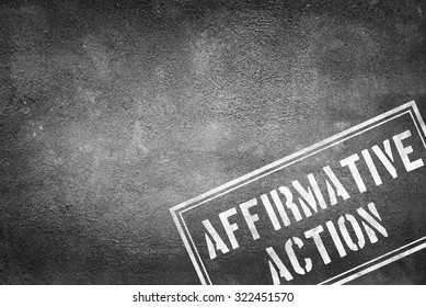 Affirmative Action Stamp On Concrete Wall 