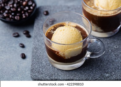 Affogato coffee with ice cream on a glass cup Grey slate background