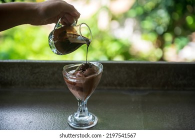 Affogato Hot Fudge Pouring Over Chocolate Ice Cream In Glass