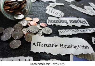 Affordable Housing Crisis newspaper headline and related economic news, with coins                               