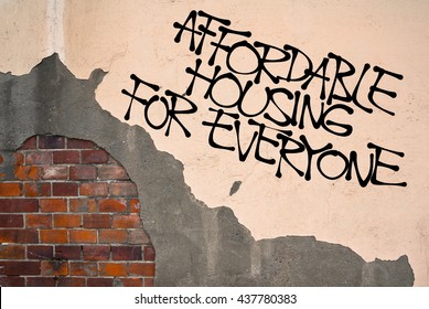 Affordable Housing For Everyone - Handwritten Graffiti Sprayed On The Wall, Anarchist Aesthetics. Appeal To Provide Social Housing For Poor People. Prevention Against Homelessness