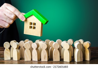 Affordable mortgage loan to buy housing. A government official hands over housing property. Residence permit and migration. Realtor sells real estate. Big waiting list, corruption risks.