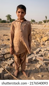 Afghan Refugee Kid Standing -  Karachi, Pakistan