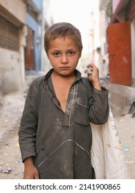 Afghan Refugee Kid Working As Garbage Collector - Karachi, Pakistan			