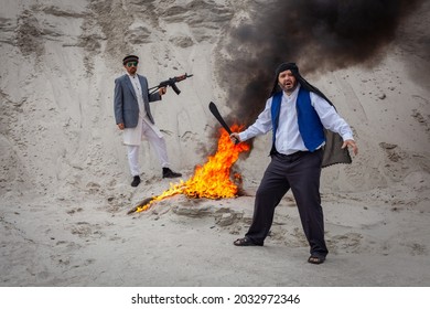 Afghan terrorists are destroying them with fire. The Taliban are intimidating people with weapons in their hands. Insurgent fighters are a terrorist guerrilla organization.