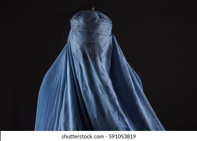 an Afghan woman wearing a burqa
 - Shutterstock ID 591053819