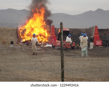 Afghanistan - Circa 2006: A Burn Pit At A US Base.