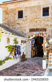 Afionas, Corfu, Greece - Aug 03, 2020: Artesian Shop Of Handmade Olive Wood Articles And Souvenirs In Ancient Greek House In Old Afionas Village On Corfu Island In Greece. Famous Touristic Destination