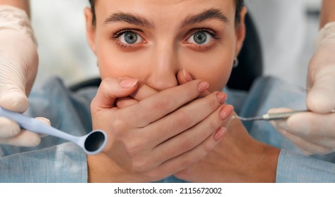 Afraid of dentist or fear of doctor. Scared and nervous patient in hospital. Upset woman with phobia having panic attack in clinic before medical operation.