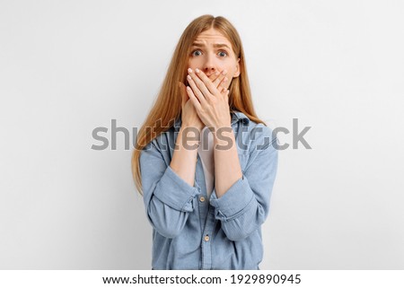 I'm afraid. Portrait of a frightened woman, on an isolated white background