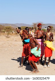 AFRICA, KENYA, MASAI MARA NATIONAL RESERVE, AUGUST 3,  2010: Masai Village Tribe. Traditional Jumping Dance Of The Masai Mara Tribe, Jumping.