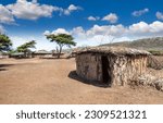 Africa. Masai Mara. Reservation in Kenya. The Masai Mara tribe. An old hut made of clay and twigs.  The house is made of clay.