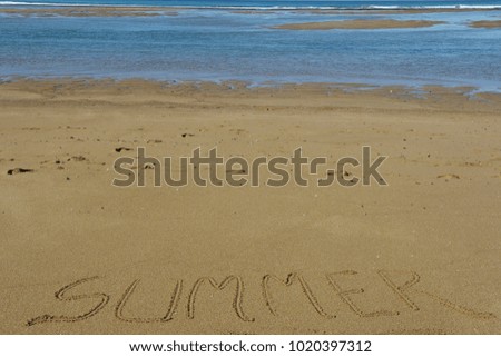 Africa - Morocco - summer is coming - written summer on the sand at the beach