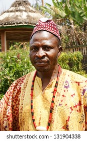 AFRICA,CAMEROON, FONGO-TONGO - JANUARY 20: African Village Chief Posing In Traditional Clothes On January, 20, 2013 Cameroon. Bamileke Tribe Is The Dominant Ethnic Group In Cameroon's West Provinces.