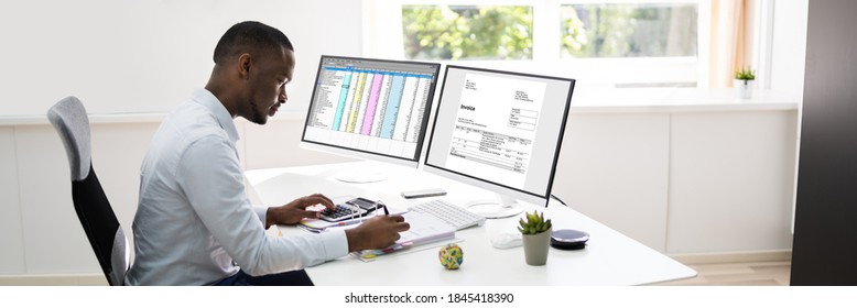African American Accountant Using Electronic Invoice Software