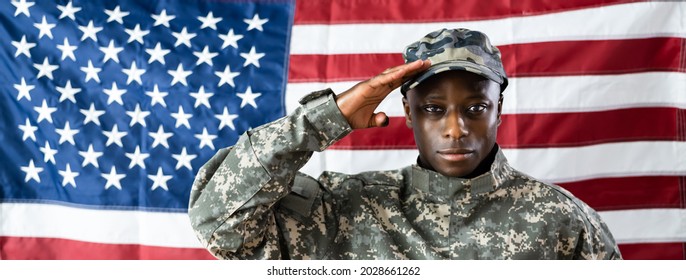 African American Army Soldier Saluting In Front Of American Flag - Powered by Shutterstock