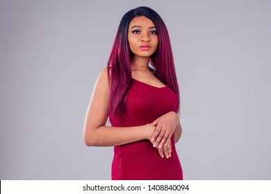 African American Beautiful Woman Creative Hair Coloring Dye Purple Color On White Background In Studio