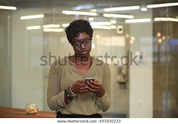 African American Black Girl Texting Browsing Stock Photo