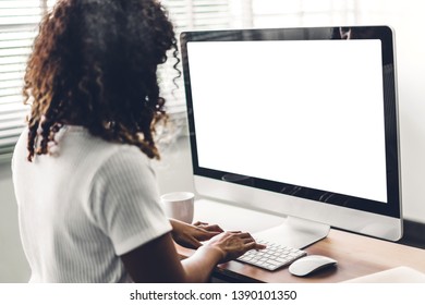 African American Black Woman Using Computer With White Mockup Blank Screens In Modern Work Loft