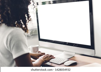 African American Black Woman Using Computer With White Mockup Blank Screens In Modern Work Loft