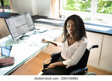 African American Black Woman Using Computer. Handicapped Worker With Disability