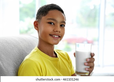 African American Boy Drinking Milk, Closeup