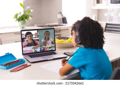 African American Boy Wearing Headphones Looking Stock Photo 2173342661 ...