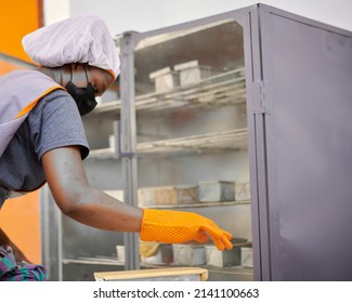 African American Bread Baker Baking Bread At Her Black Owned Business