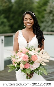 African American Bride In White Dress With Tropical Flowers