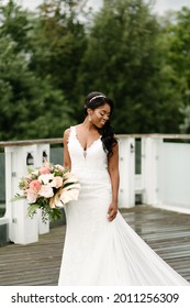 African American Bride In White Dress With Tropical Flowers