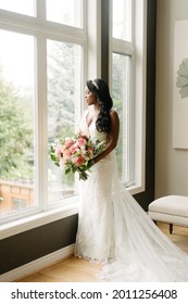 African American Bride In White Dress With Tropical Flowers