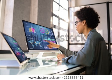 African American Business Data Analyst Woman Using Computer