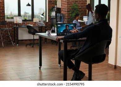 African American Business Man In Remote Digital Teleconference With Coworker Discussing About Marketing Strategy. Research Agency Team Leader On Internet Meeting Videocall With CEO Talking About Funds