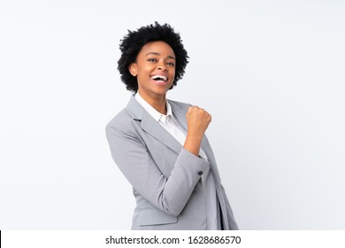 African american business woman over isolated white background celebrating a victory - Shutterstock ID 1628686570