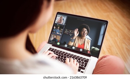 African american business woman waving hand during online meeting with multiracial colleagues. unaltered, business, wireless technology, working, meeting, teamwork and office concept. - Shutterstock ID 2163863709