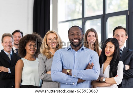 African American Businessman Boss With Group Of Business People In Creative Office, Successful Mix Race Man Leading Businesspeople Team Stand Folded Hands, Professional Staff Happy Smiling