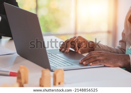 African american businessman using computer in ffice