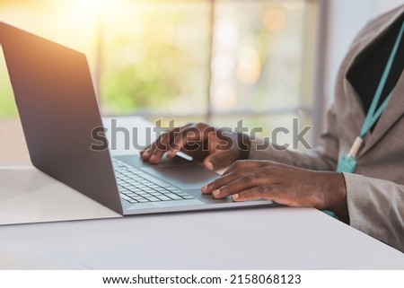 African american businessman using computer in ffice